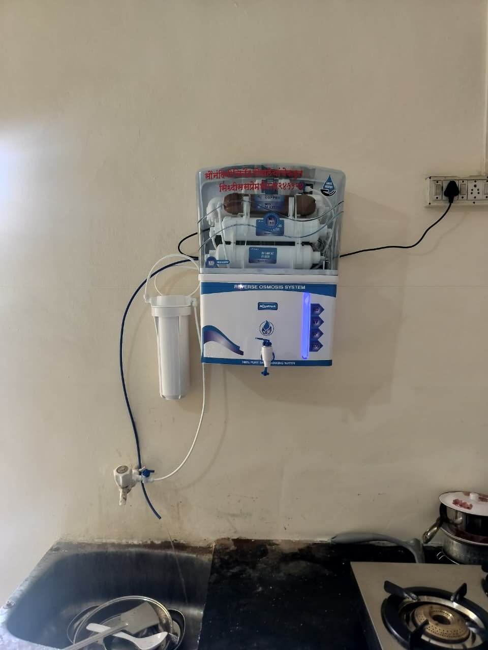 Water purifier installed in a home kitchen